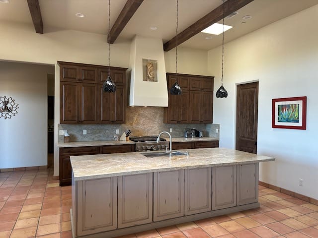 Rustic kitchen with wood cabinets and large island